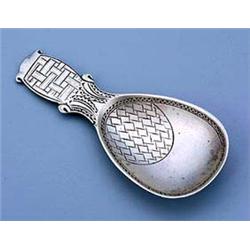 A Liberty & Co silver caddy spoon, the bowl of oval shape and decorated with panel resembling basket
