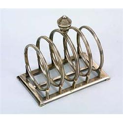 A stylish H.G. Murphy silver toastrack, formed by five graduated and reeded hoops with a geometric t