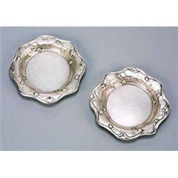 A pair of Austro-Hungarian Art Nouveau circular silver trays, for possible use as wine bottle coaste