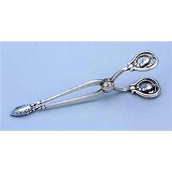 A pair of Georg Jensen silver sugar nips, of scissor type with simple foliate grips and almost heart