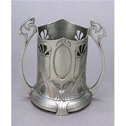 A W.M.F. pewter soda-syphon coaster, of openwork cylindrical shape embellished with geometric plantf