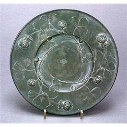 An unusual French Art Nouveau pewter circular plate, designed by Jules Brateau, embellished in relie