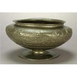 A Liberty & Co. 'English Pewter' large jardiniere, of compressed form, embellished around the should