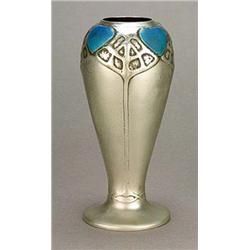 A Liberty & Co 'Tudric' pewter vase, of tapering oviform rising from a spreading circular foot, embo