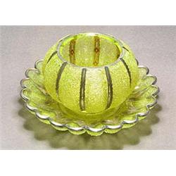 A Continental glass bowl and stand, the vessel of compressed form with lobed sides, of lemon tone wi