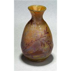 A French Art Nouveau iridescent glass vase, by Duc Amedee de Caranza, of oviform with a flared neck.