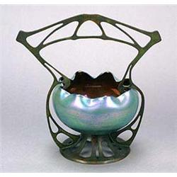 A Bohemian Art Nouveau bronze mounted iridescent glass bowl, of compressed globular shape with an un