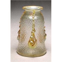 A small Loetz iridescent glass vase, of tapering form with slightly flared neck, the slightly dimple