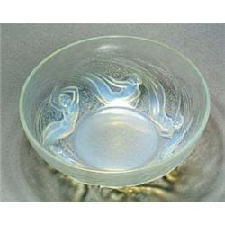 'Ondines' A Lalique opalescent glass bowl, moulded on the exterior in relief with six mermaids amid.