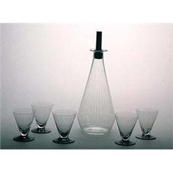 A Stevens and Williams glass decanter and stopper and five matching glasses, designed by Keith Murra