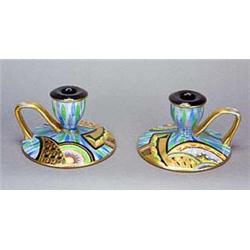 A pair of Carlton Ware 'Scimitar' chamber candlesticks, with flared circular bases, oviform sconces.