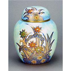 A Carlton Ware 'Starflower' ginger jar and cover, transfer-printed in gilt and painted in vivid colo