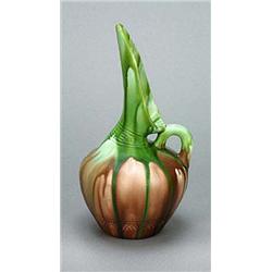 An Ault Pottery ewer, designed by Christopher Dresser, the vessel of shouldered oviform with an exte