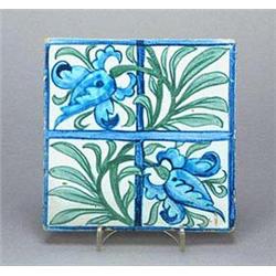 A Morris & Co. 'Tulip and Trellis' six inch pottery tile, painted in 'Persian' colours with the tile