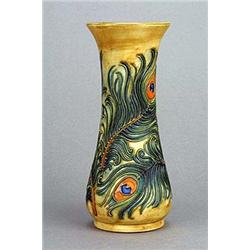 A Moorcroft 'Phoenix' vase (1998), of waisted cylindrical shape, tube-lined with peacock feathers pi