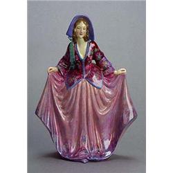 A Leslie Johnson hand-painted figure, modelled as a young woman wearing a mauve bonnet tied with a g