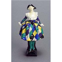 'Harlequinade' (HN585), A Royal Doulton figure, by Leslie Harradine, 17cm.high, 1923-1938, repaired.