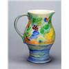 Image 1 : A Royal Doulton Brangwyn Ware 'Harvest' pattern jug of oviform with strap handle painted in colours.