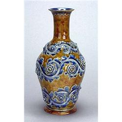 A Doulton Lambeth stoneware oviform 'seaweed' vase, by George Tinworth, decorated with meandering ho