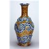 A Doulton Lambeth stoneware oviform 'seaweed' vase, by George Tinworth, decorated with meandering ho