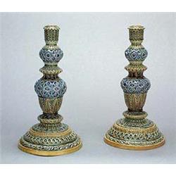 An early pair of Doulton Lambeth stoneware candlesticks, by Frank A. Butler, each of knopped form ri