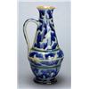 An early Doulton Lambeth stoneware ewer, by Arthur Barlow, of oviform with tapering neck and loop ha