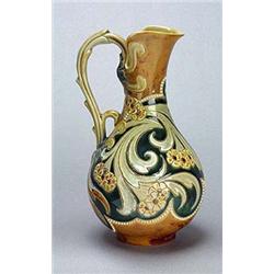 A Doulton Lambeth stoneware ewer, by Eliza Simmance, the oviform body having a cut-out shaped neck a