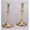 Image 1 : A pair of bronze candlesticks, in the manner of Lutyens, each with lobed and beaded sconces supporte