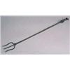 A Thornton and Downer wrought iron toasting fork, having three tines and twisted decoration along it