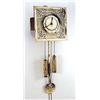 An Arts and Crafts Brass wall clock, possibly Scottish, in the manner of Margaret Gilmour, the squar