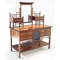 An Anglo-Japanese Mahogany Dressing Table, in the manner of Godwin, the superstructure having a cent