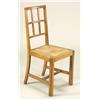 Three Heals Arts and Crafts oak lattice-back upright chairs, each having a drop-in rush seat, raised