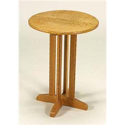 An Arts and Crafts small oak table, by Stanley Webb Davies of Windermere, with a circular top having