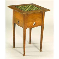 An Arts and Crafts oak and tile-topped occasional table, possibly retailed through Liberty & Co, the