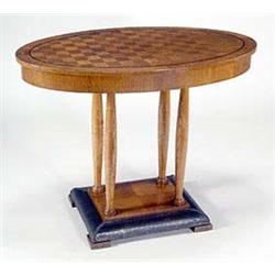 A Continental secessionist oak centre table, possibly Dutch or Austrian, having an oval top with che