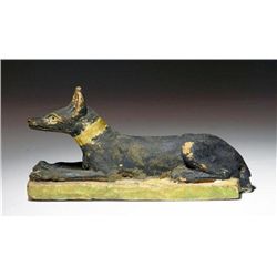 An Egyptian Carved Wood Figure of Anubis