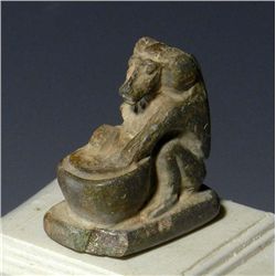 An Egyptian Carved Stone Seated Baboon