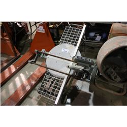 DELTA ARM SAW ON MOBILE BENCH