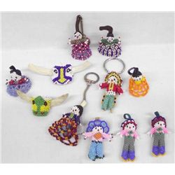 Collection of Beaded Dolls, Keyrings, & Slides