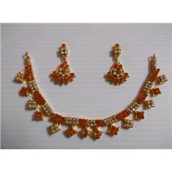 127.90 CTW GOLD PLATED RUBY AND PEARLS NECKLACE AND EAR