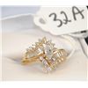 Image 1 : LADIES 18K YELLOW GOLD DIAMOND RING WITH ONE  APPROX. 1/3CT MARQUISE CUT CENTER SOLITAIRE  AND 18 RO