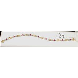 14K YELLOW GOLD RUBY AND DIAMOND BRACELET  WITH NINE NATURAL RUBY'S AND EIGHTEEN ROUND  FULL CUT DIA