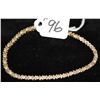 Image 1 : WOMENS 14K YELLOW GOLD DIAMOND BRACELET WITH  THIRTY SEVEN DIAMONDS SET IN "X" 14K YELLOW  GOLD BRAC