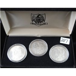 SET OF THREE MORGAN DOLLARS IN DISPLAY CASE -  1885-0, 1886 & 1887 - SOLD PER COIN TIMES 3