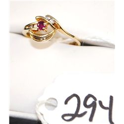 LADIES 14K YELLOW GOLD RUBY & DIAMOND RING  WITH ONE ROUND RUBY CENTER AND FIVE ROUND  CHANNEL SET D