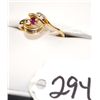 Image 1 : LADIES 14K YELLOW GOLD RUBY & DIAMOND RING  WITH ONE ROUND RUBY CENTER AND FIVE ROUND  CHANNEL SET D