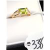 Image 2 : 14K YELLOW GOLD PERIDOT & DIAMOND RING WITH  ONE EMERALD CUT PERIDOT MAIN GEMSTONE AND  FOUR ACCENT 