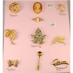 VINTAGE COSTUME JEWELRY INCLUDES TRIFARI,  MONET, KIS TOTAL OF 10 PIECES