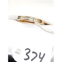 14K YELLOW GOLD DIAMOND RING WITH 15 CHANNEL  SET ROUND DIAMONDS - APPROX. 1/3CTTW - WEIGHS  1.60 GR