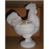 A white Pyrex cockerel